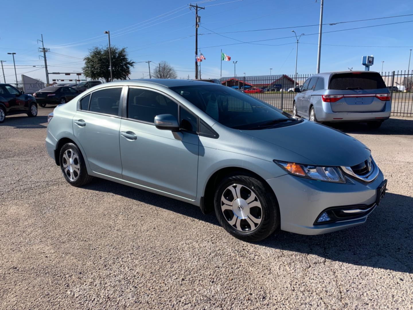 2013 Blue /gray Honda Civic Hybrid (19XFB4F27DE) , AUTOMATIC transmission, located at 1830 North Belt Line Road, Irving, TX, 75061, (469) 524-0199, 32.834373, -96.993584 - Photo#6